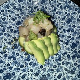 Wahoo sashimi with black garlic, yuzu & avocado.