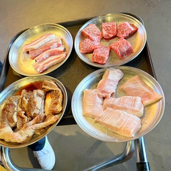 Ari Korean BBQ - Top right is Boneless Prime Short Rib $43 (very good even a bit pricey) & the rest are from Beef & Pork Combo Medium Size $90 - Korean Near Me - Carrollton, Texas
