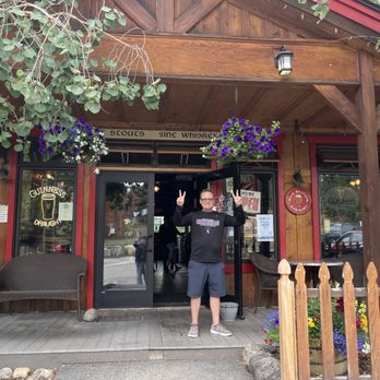 Cala Pub and Restaurant - a man standing in front of the entrance - Pubs Near Me - Dillon, Colorado