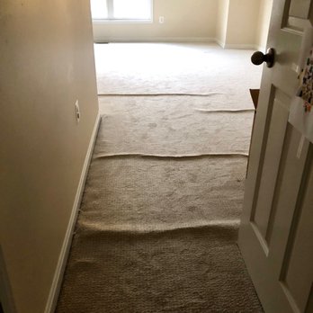 CJ's Carpet Care - Before, many rolled up spots of carpet. - Carpet Cleaning Near Me - Gaithersburg, Maryland