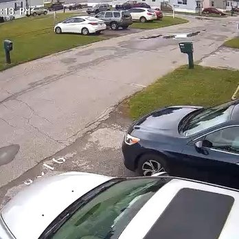 Zore's - Red and white vehicles parked on grass, don't tell me everyone is treated the same - Body Shops Near Me - Indianapolis, Indiana