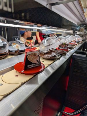 Kura Revolving Sushi Bar by null