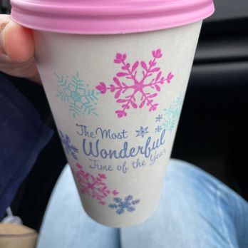 Coffee Queen - a person holding a cup of coffee - Coffee & Tea Near Me - Anchorage, Alaska