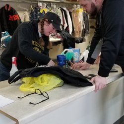 Spin City - Spin City manager Alexis helps a customer with sewing question