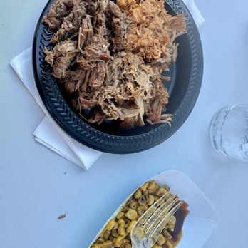 Beans BBQ Catering - Pork, chicken and beef on the plate and corn in the bowl - Caterers Near Me Beans BBQ Catering - Pork, chicken and beef on the plate and corn in the bowl - Caterers Near Me