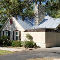 AC Cornerstone Building - We added a private covered patio complete with wire netting to prevent the hawks from taking her miniture dogs