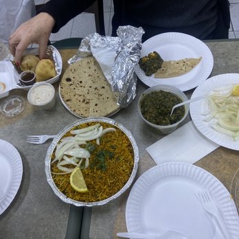 Eat Spice - Lamb biriyani, roti, samosas, onion salad and sag paneer. - Indian Near Me - White Haven, Pennsylvania Eat Spice - Lamb biriyani, roti, samosas, onion salad and sag paneer. - Indian Near Me - White Haven, Pennsylvania