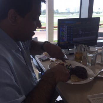 Gulfstream Park - Shawn concentrating hard on his NY  Strip (if only he would have concentrated on the Races a bit more! - Casinos Near Me - Hallandale Beach, Florida