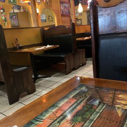 El Mesquite Mexican Grill - Booths around my area. Not to bad a few rips in seat.