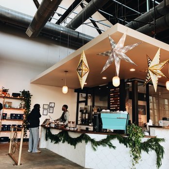 East Pole - View of Bar / Retail Wall. Love the holiday decor - Coffee Roasteries Near Me - Atlanta, Georgia