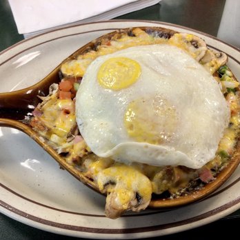 Egg Works - The Works Skillet Breakfast: ham, bacon, sausage, mushrooms, onions, tomato, green bell pepper, cheese, over potatoes - Breakfast & Brunch Near Me - Las Vegas, Nevada