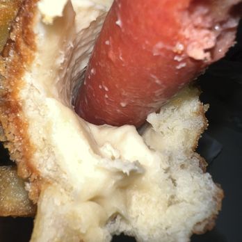 T% Coffee + Tea - Davis  - Raw dough - A bread roll with a hot dog sausage inserted, showing the bread's interior and the sausage's surface. - Bubble Tea Near Me - Davis, California