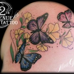12th Avenue Tattoo - Butterflies and flower color shoulder tattoo by Nina Gaudin of 12th Avenue Tattoo in Nampa, Idaho!