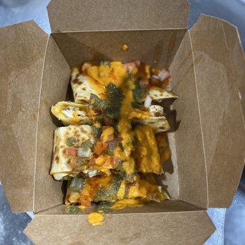 The Tortilla Taco Bar - Chicken quesadilla with all the sauces. - Tacos Near Me - Kingston, New York The Tortilla Taco Bar - Chicken quesadilla with all the sauces. - Tacos Near Me - Kingston, New York