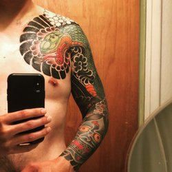 Garage Ink Tattoo Studios & Fine Art Gallery - Right arm complete