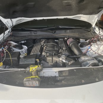Trusty Auto Repair - Pro charger on bottom right and re-routing of wires for headlight modification. - Auto Repair Near Me - Corvallis, Oregon Trusty Auto Repair - Pro charger on bottom right and re-routing of wires for headlight modification. - Auto Repair Near Me - Corvallis, Oregon