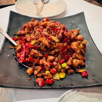 Ollie's Sichuan - Spicy chicken: if you can't eat spicy food, we suggest the chef to use less chili pepper, but less chili pepper will lose the original flavo - Szechuan Near Me - New York, New York Ollie's Sichuan - Spicy chicken: if you can't eat spicy food, we suggest the chef to use less chili pepper, but less chili pepper will lose the original flavo - Szechuan Near Me - New York, New York