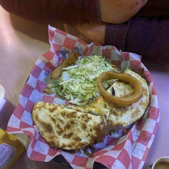 Coyote's Nixa Grille - Quesadilla Burger (onion rings were and upcharge) Well worth it! - Sports Bars Near Me - Nixa, Missouri
