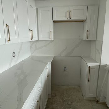 Expert Marble and Granite - New Calacatta type Quartz installed. Featuring cabinet high backsplash. - General Contractors Near Me Expert Marble and Granite - New Calacatta type Quartz installed. Featuring cabinet high backsplash. - General Contractors Near Me