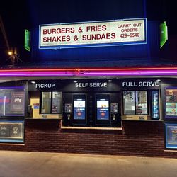 Front of the business with menus, touch screens, and windows