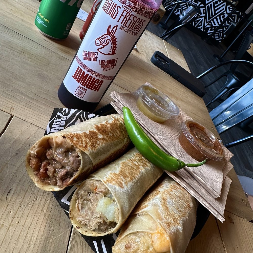 Los De Juarez Burritos - This is half the size of the burritos, the rest of the burritos are under the napkins. They are looooong. - Mexican Near Me - Anaheim, California Los De Juarez Burritos - This is half the size of the burritos, the rest of the burritos are under the napkins. They are looooong. - Mexican Near Me - Anaheim, California