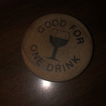 Copper Door - a glass of wine on a wooden table - Dive Bars Near Me - Glendale, Arizona Copper Door - a glass of wine on a wooden table - Dive Bars Near Me - Glendale, Arizona