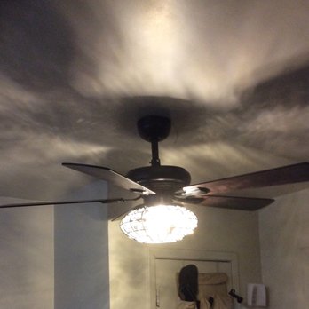 CN Coterie - a ceiling fan with a light fixture - General Contractors Near Me - New York, New York CN Coterie - a ceiling fan with a light fixture - General Contractors Near Me - New York, New York