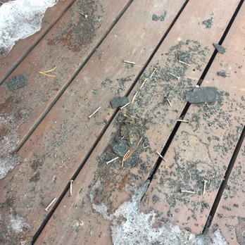 DaBella - This was my deck after they finished "cleaning up" their job debris. - Roofing Near Me - Denver, Colorado DaBella - This was my deck after they finished "cleaning up" their job debris. - Roofing Near Me - Denver, Colorado