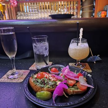 Trader Sam's Enchanted Tiki Bar - Island Garden Avocado Toast (on a croissant) 3/5 Prosecco w/ Pineapple juice 5/5 Water, because we are responsible adults. - Tiki Bars Near Me - Anaheim, California Trader Sam's Enchanted Tiki Bar - Island Garden Avocado Toast (on a croissant) 3/5 Prosecco w/ Pineapple juice 5/5 Water, because we are responsible adults. - Tiki Bars Near Me - Anaheim, California