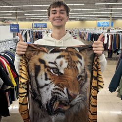 Savers - a tiger one and only size shirt that fits anyone it's very good very very reusable and has really cool side patterns of a tiger stripes.