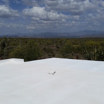 Proficient Contracting & Services, LLC - Foam roof with final coat of white elastromeric coating - Roofing Near Me