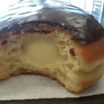 Slikker's Donut - Inside my custard filled chocolate bar. - Donuts Near Me - San Leandro, California Slikker's Donut - Inside my custard filled chocolate bar. - Donuts Near Me - San Leandro, California