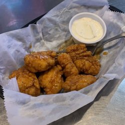 Campus Bar & Grill - 40 cent wing Wednesday. Honey garlic boneless of course. Saucy and juicy, just how I like it.