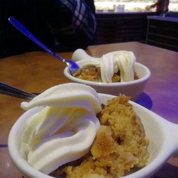 Sizzler - Bread Pudding topped with vanilla ice cream. - Seafood Near Me - Ontario, California Sizzler - Bread Pudding topped with vanilla ice cream. - Seafood Near Me - Ontario, California