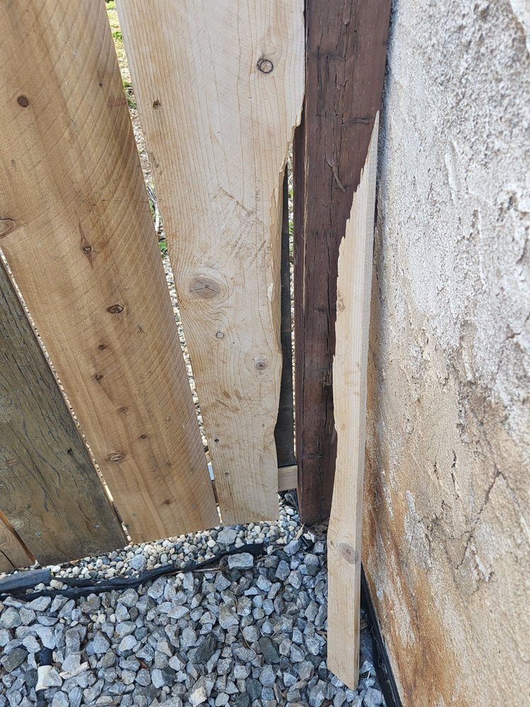 Slide of Tugwell Roofing