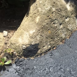 Options Sealcoating - Beautiful black mark I had to pay a professional to put on my landscape rocks.