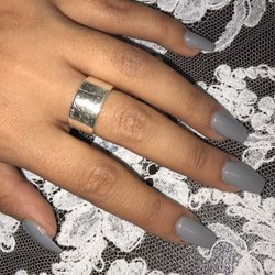 The Spot Nail Bar - I went to Nancy this morning after she opened early to accommodate me. She was quick and precise and I will definitely be going back.