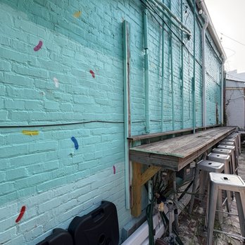 The Greenhouse - Biloxi - Seating outside restaurant in alley - Breakfast & Brunch Near Me - Biloxi, Mississippi