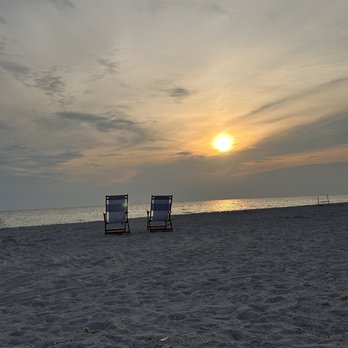 Ritz Beach Club - Breathtaking sunset. They leave the chairs on the beach so that you can watch the sun go down. - Resorts Near Me - Sarasota, Florida Ritz Beach Club - Breathtaking sunset. They leave the chairs on the beach so that you can watch the sun go down. - Resorts Near Me - Sarasota, Florida