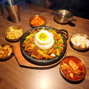 Jin Cook - Spicy pork hot stone (with fried egg) and banchan - Korean Near Me - Northridge, California Jin Cook - Spicy pork hot stone (with fried egg) and banchan - Korean Near Me - Northridge, California
