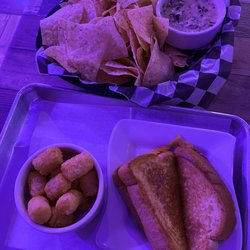 Hurricane Creek Saloon - Spinach and artichoke dip (top), grilled cheese with tater tots (bottom)