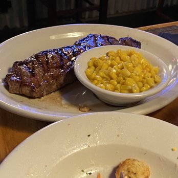 Texas Roadhouse - New York strip steak with buttered corn and side salad - Barbeque Near Me - Tracy, California Texas Roadhouse - New York strip steak with buttered corn and side salad - Barbeque Near Me - Tracy, California