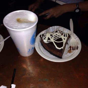 Java's Cafe - Latte and triple chocolate cheesecake! So rich and creamy - Coffee & Tea Near Me - Rochester, New York