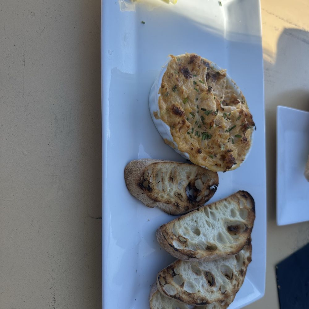Flow Restaurant and Lounge - Crab cakes a dip with local bread. Very good. - Lounges Near Me - Mendocino, California Flow Restaurant and Lounge - Crab cakes a dip with local bread. Very good. - Lounges Near Me - Mendocino, California