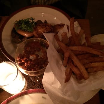 Bea - Steak and tomatoes with fries. And the fried chickpeas to start! - Cocktail Bars Near Me - New York, New York