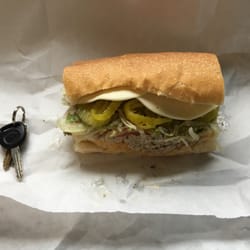 Badges Bar & Grille - This is the 6" tuna with pickles and banana peppers added. I included the keys for reference of size. cost is $5.50 + tax