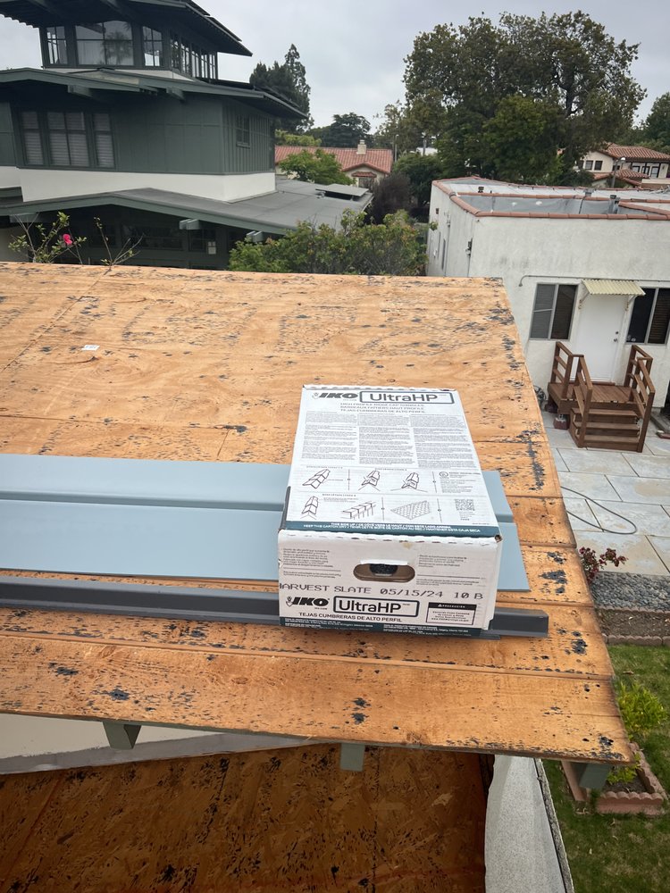 Slide of JMT Roofing