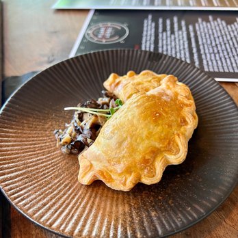 Plane & Level - Beef Sirloin Empanadas - Tapas Bars Near Me - Spring, Texas Plane & Level - Beef Sirloin Empanadas - Tapas Bars Near Me - Spring, Texas