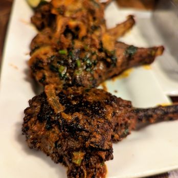 Viceroy - Lamb Lollipops. $27. French rack of lamb marinated in masala spices and cooked to a tender and charred medium well. Best I've had. No joke. - Indian Near Me - Durham, North Carolina Viceroy - Lamb Lollipops. $27. French rack of lamb marinated in masala spices and cooked to a tender and charred medium well. Best I've had. No joke. - Indian Near Me - Durham, North Carolina
