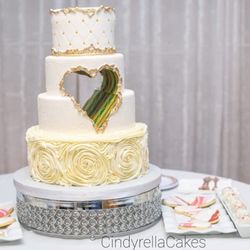 Cindyrella Cakes - Gravity defying wedding cake with heart in middle by Lithia Springs, West Atlanta bakery and Cake Supply Store Cindyrella Cakes